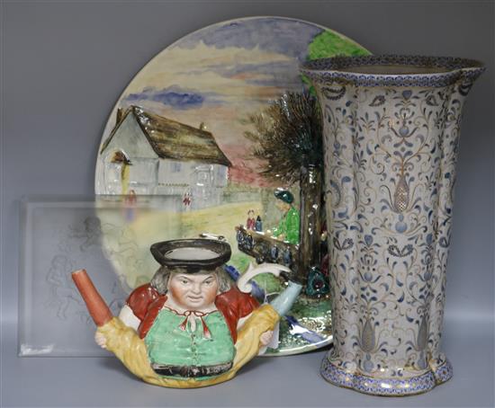 A Toby jug, decorative plate, gilt vase & glass cherub panel
